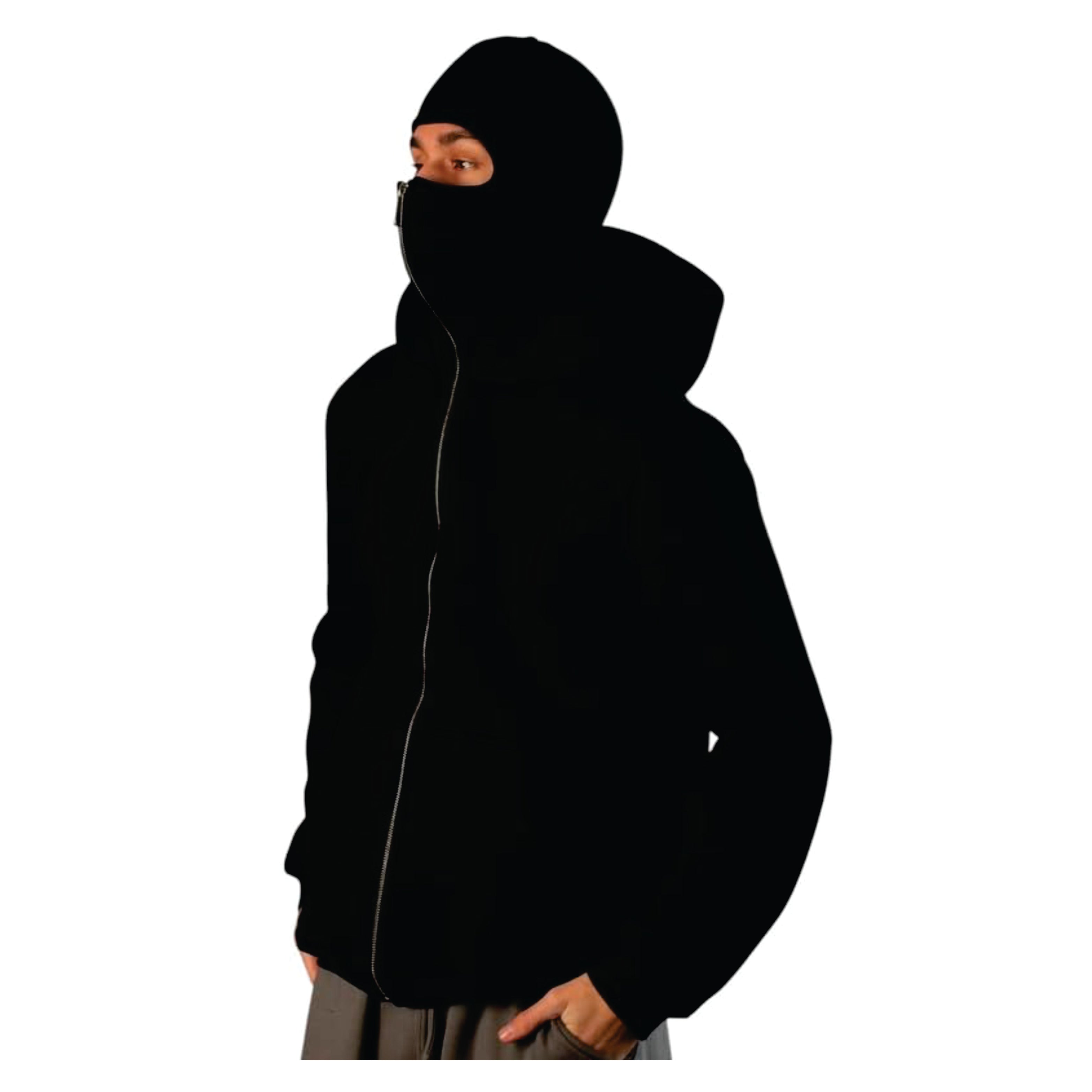 Person wearing a black hooded 