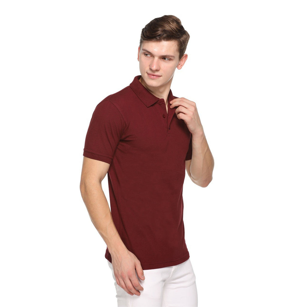 Man wearing a maroon polo t shirt on a white background