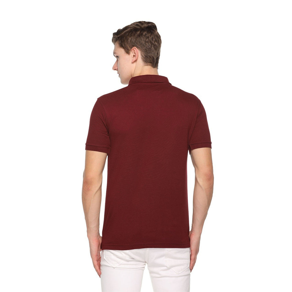 Man wearing a maroon polo shirt on a white background