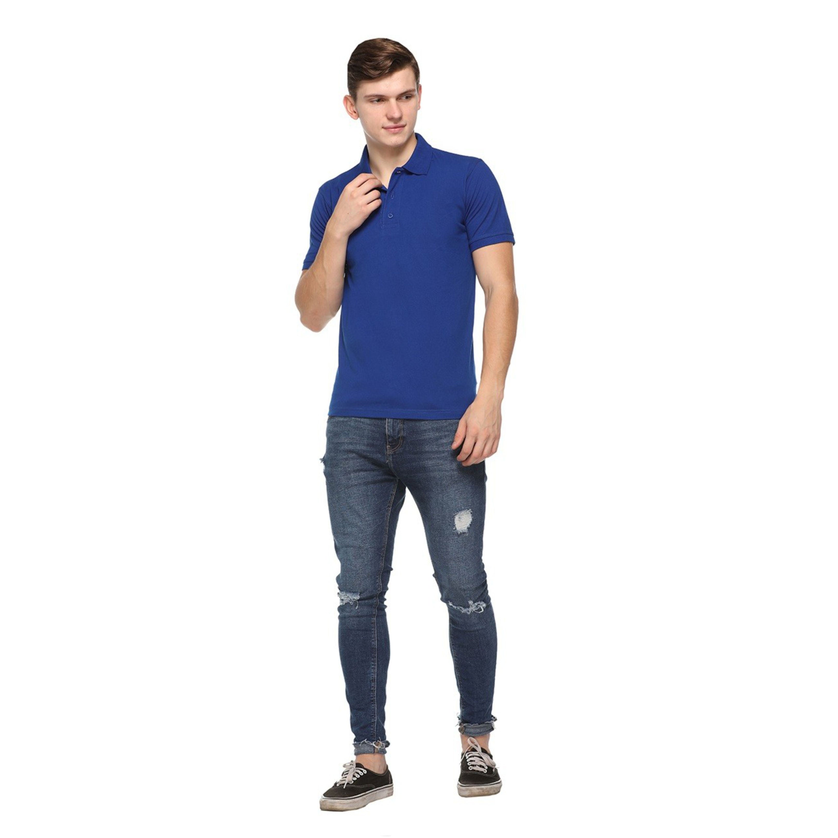 Man wearing a blue polo shirt and jeans