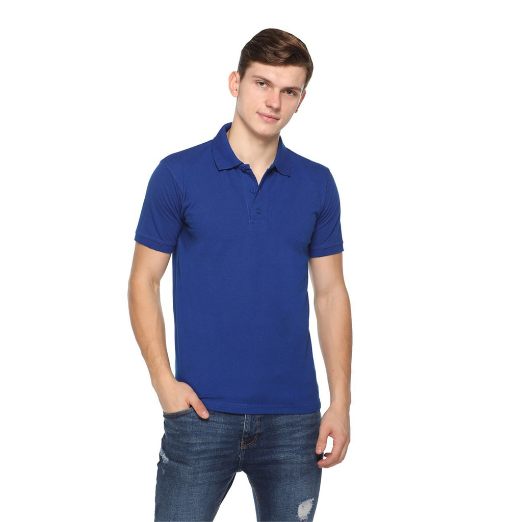 Man wearing a blue polo shirt and jeans on a white background
