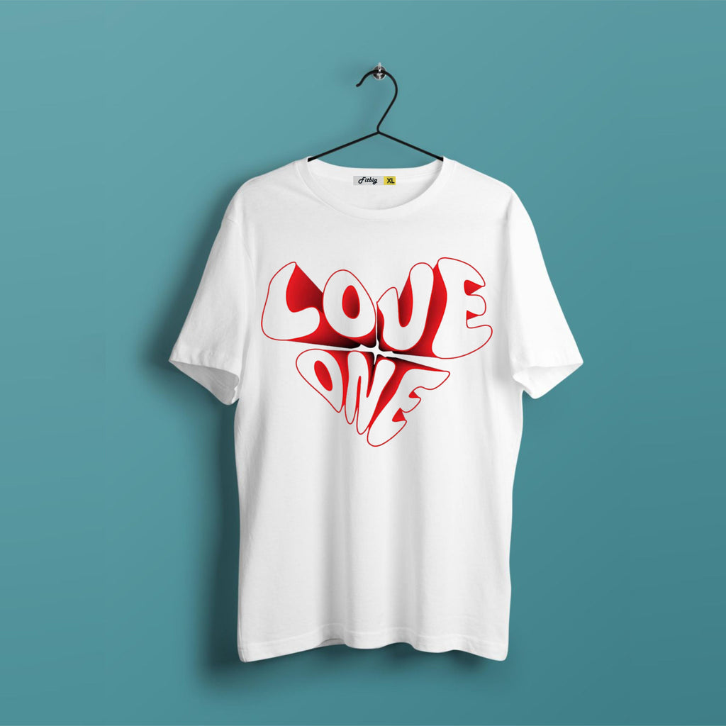White t-shirt with red 'LOVE ONE' text on a hanger against a teal background