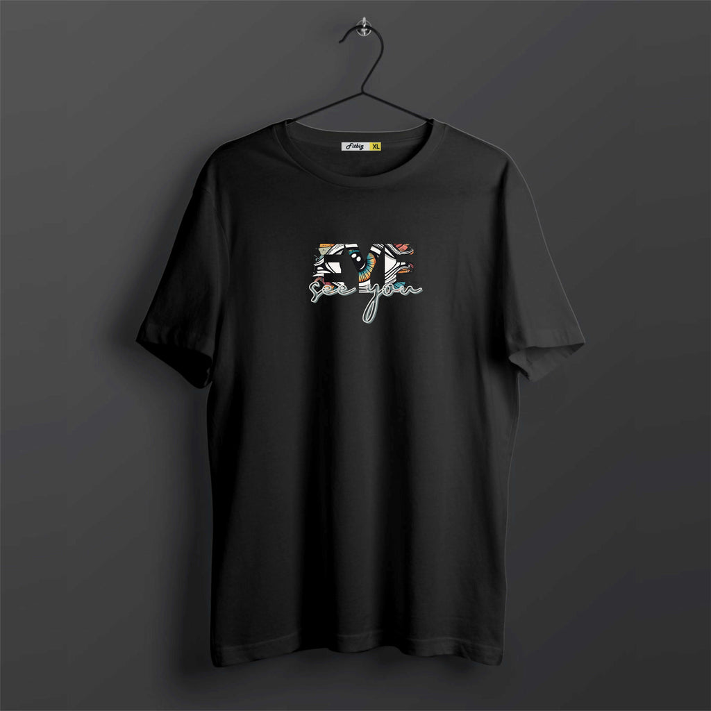 Black t-shirt with colorful graphic design on a dark background