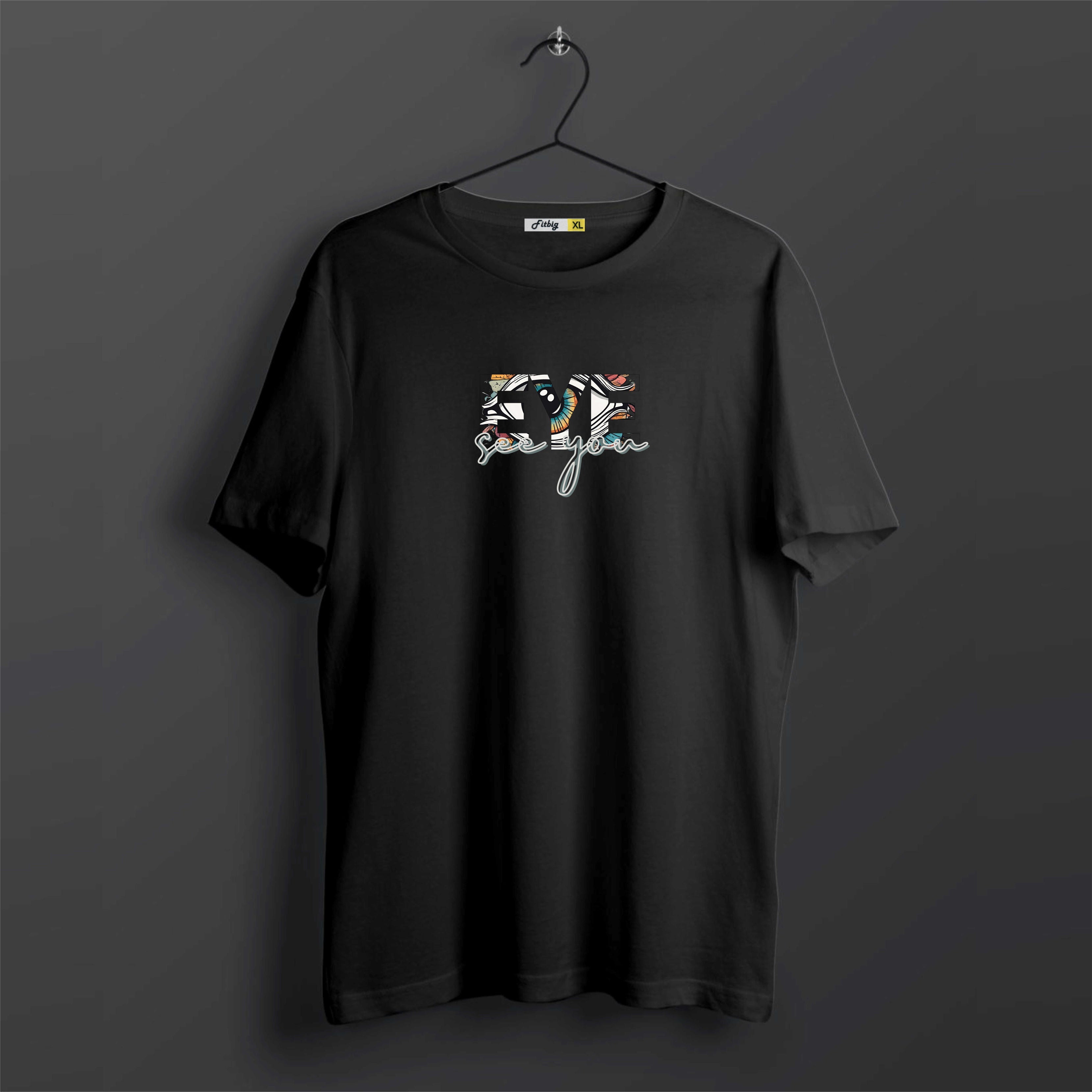 Black t-shirt with colorful graphic design on a dark background