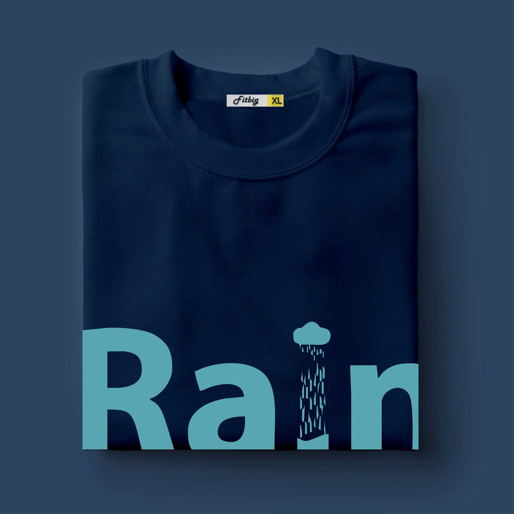 Folded navy blue t-shirt with 'Rain' and a raindrop graphic on a dark blue background
