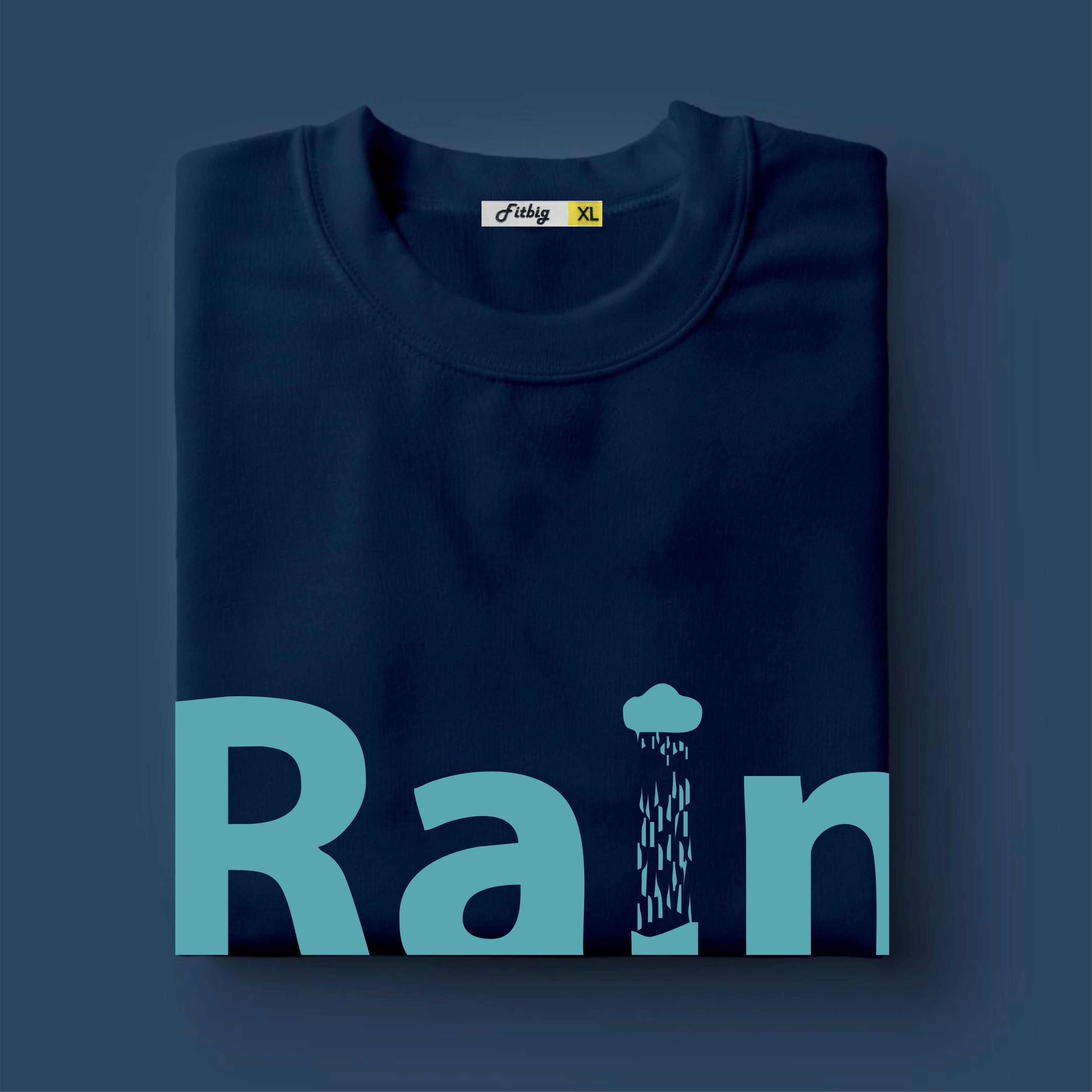 Folded navy blue t-shirt with 'Rain' and a raindrop graphic on a dark blue background