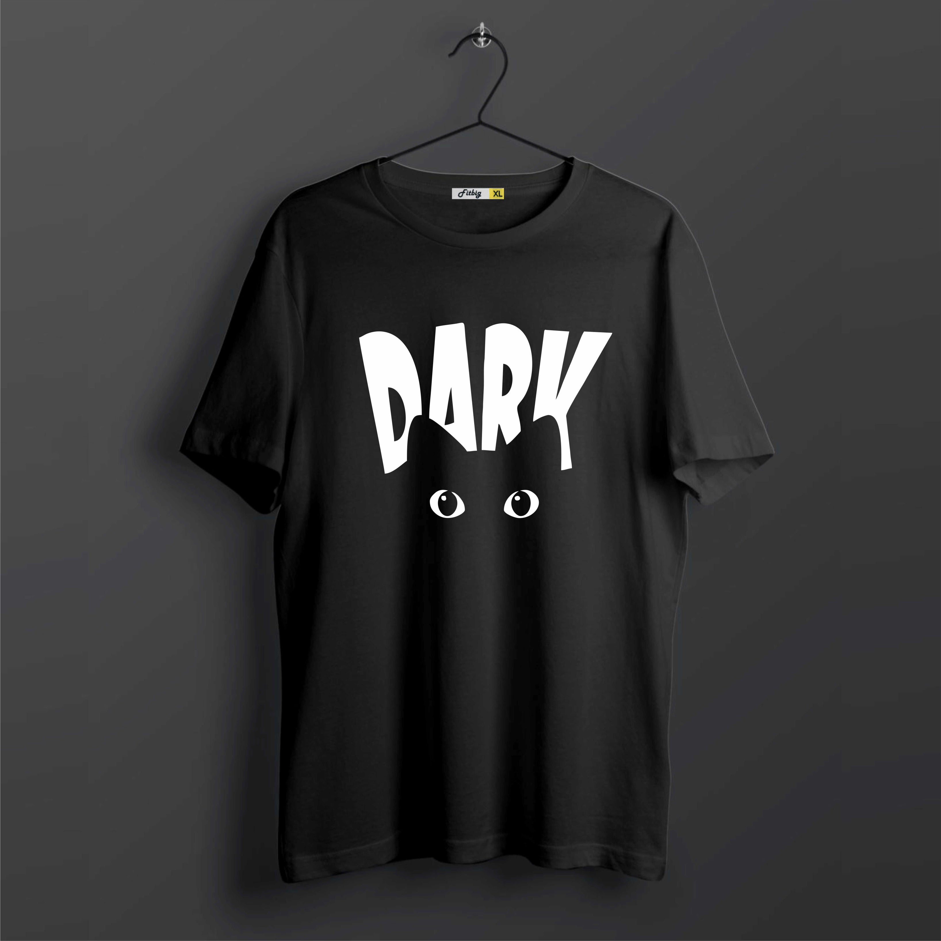 Black t-shirt with 'DARK' printed on it against a dark background