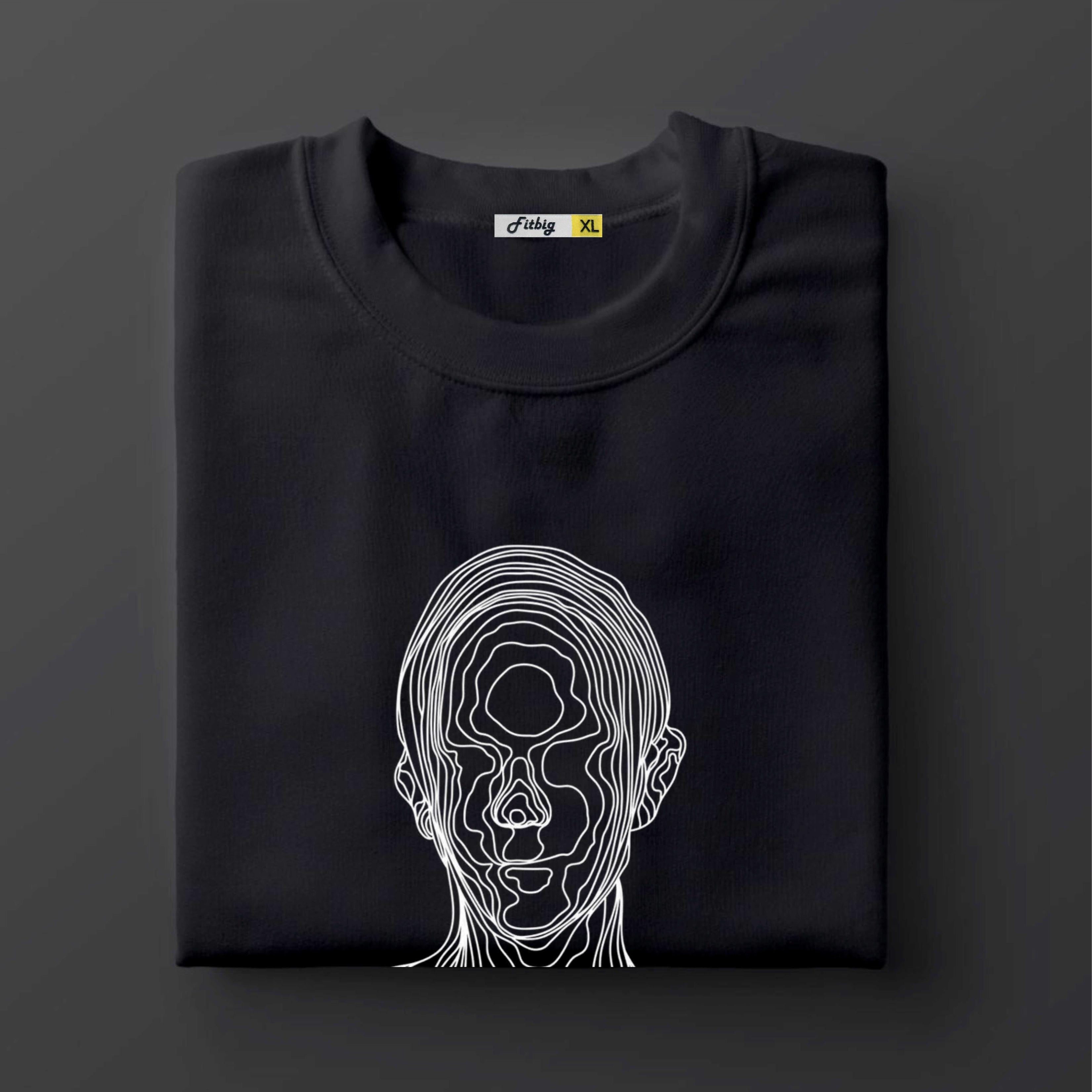 Black t shirt with a white line art design of a face on a dark background