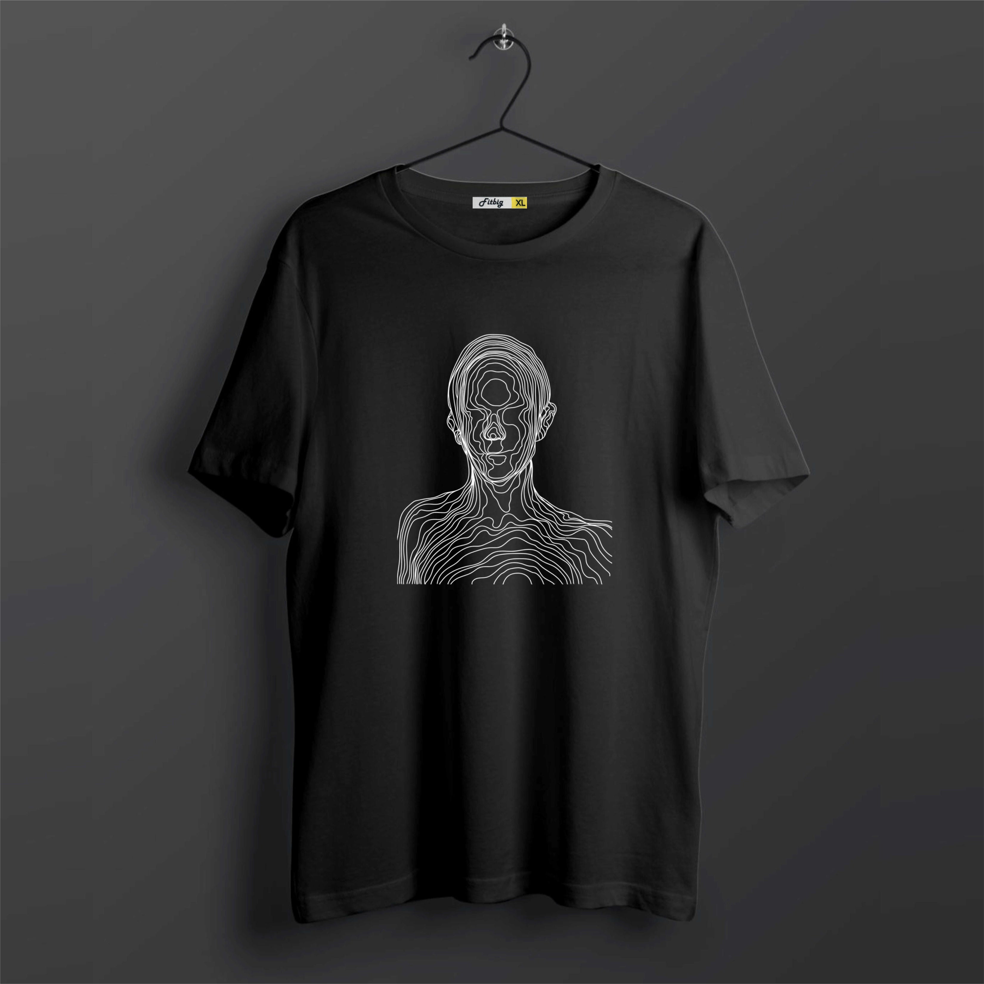 Black t-shirt with a white line art design of a face on a dark background