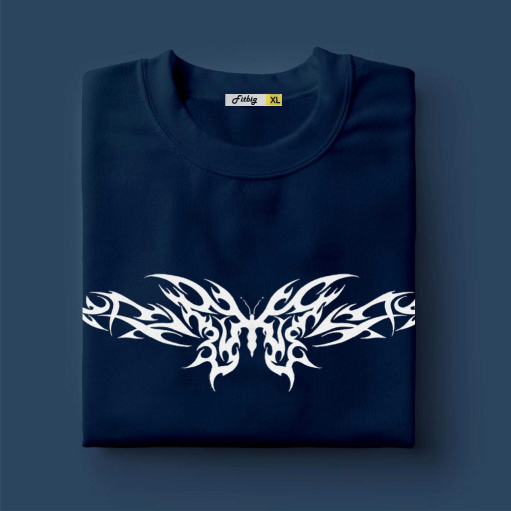 Folded navy blue t-shirt with white butterfly design on a dark blue background