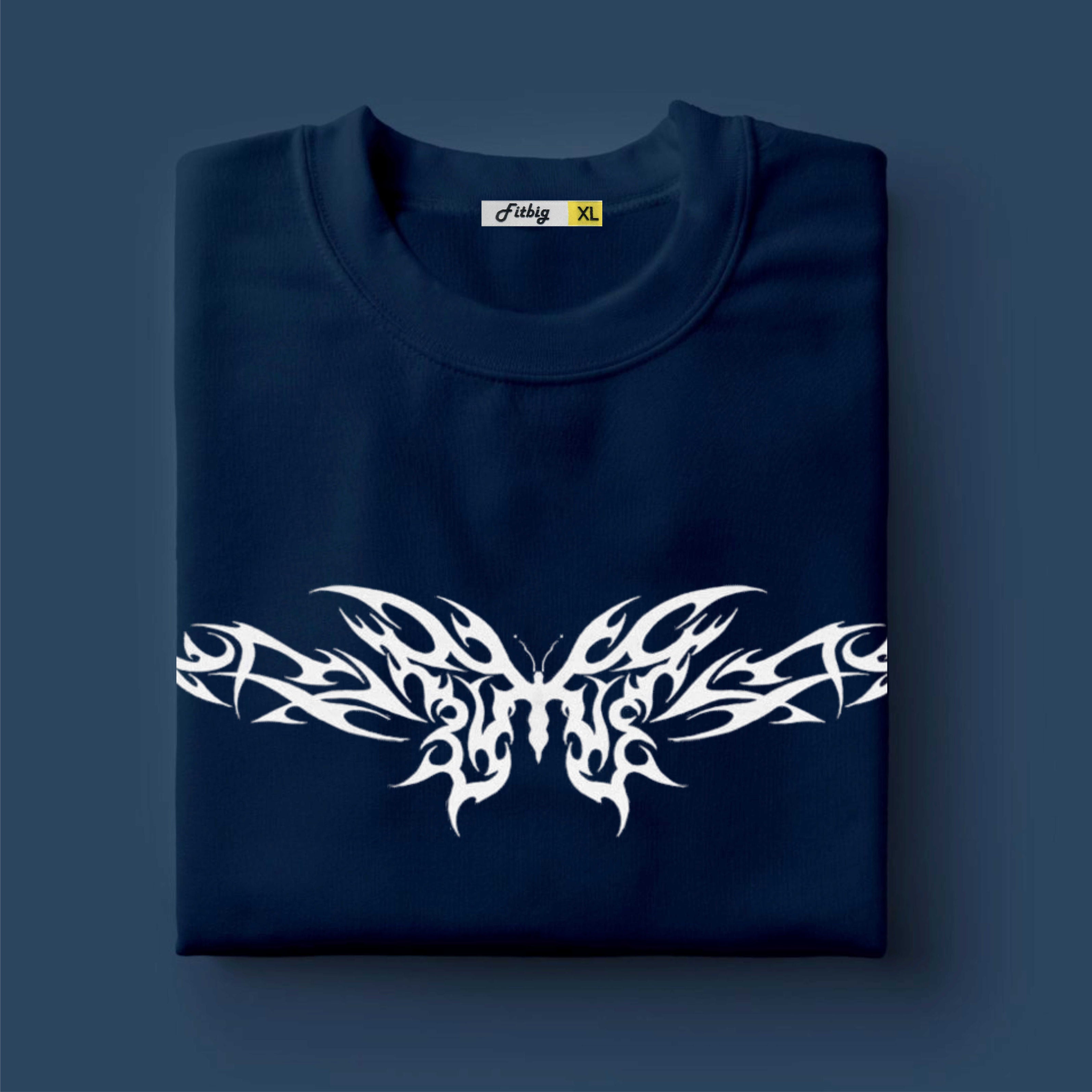 Folded navy blue t-shirt with white butterfly design on a dark blue background