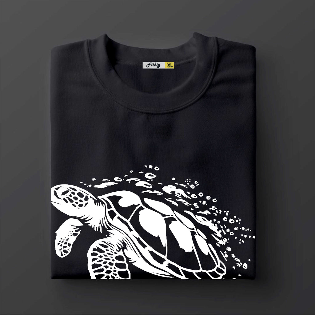 Black t-shirt with a white turtle design on a dark background