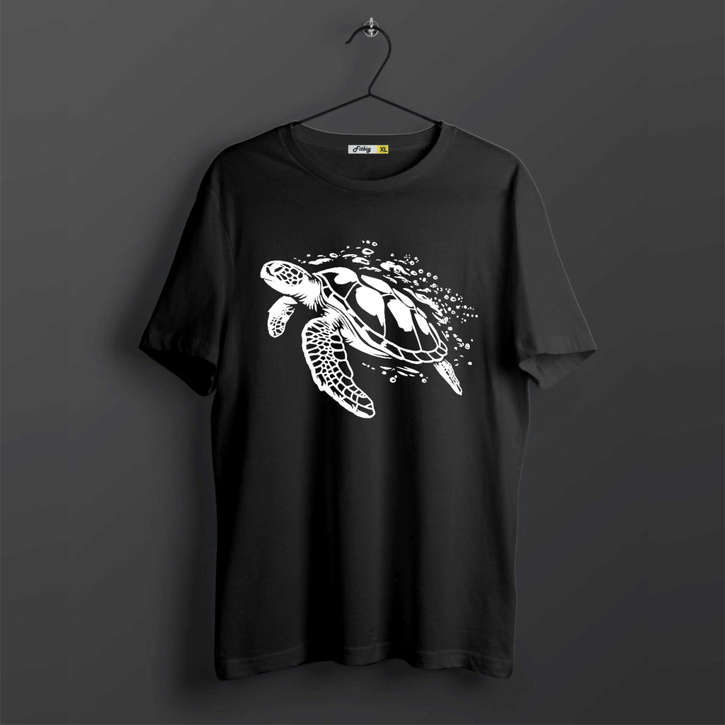 Black t-shirt with a white turtle design on a dark background