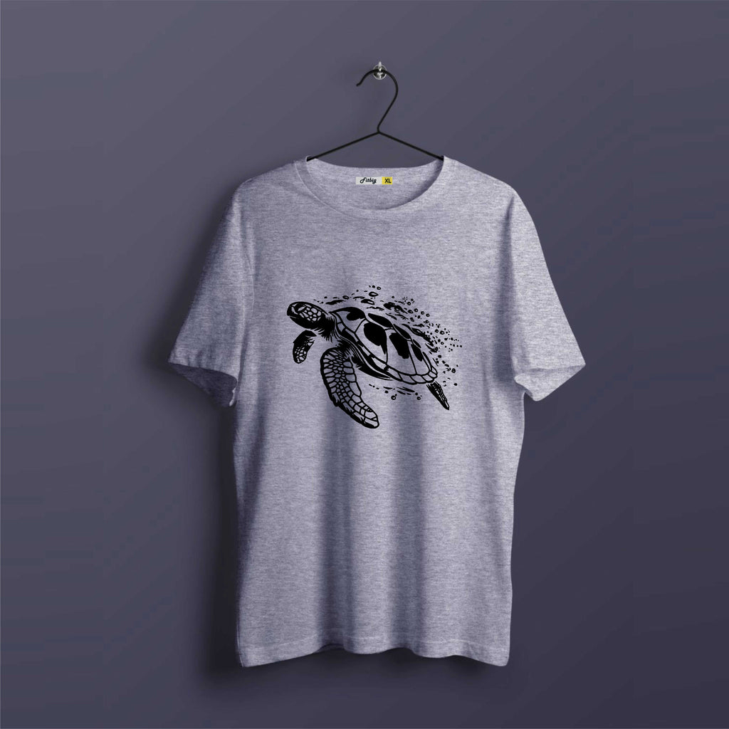 Gray t-shirt with a turtle design on a dark purple background