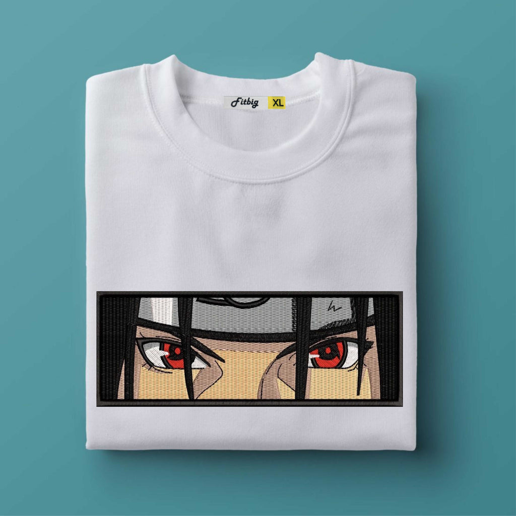 White t-shirt with anime-style eye design on a teal background