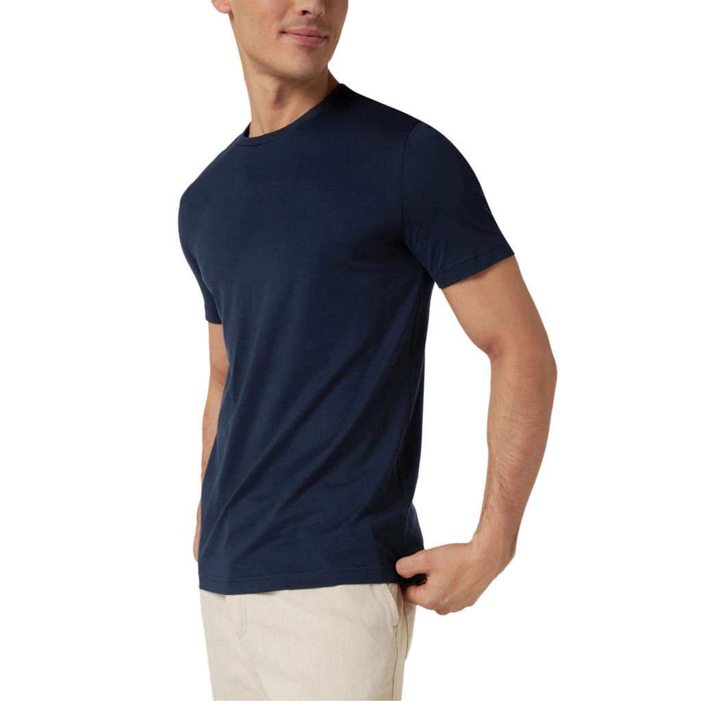 Man wearing a navy blue t-shirt on a white background