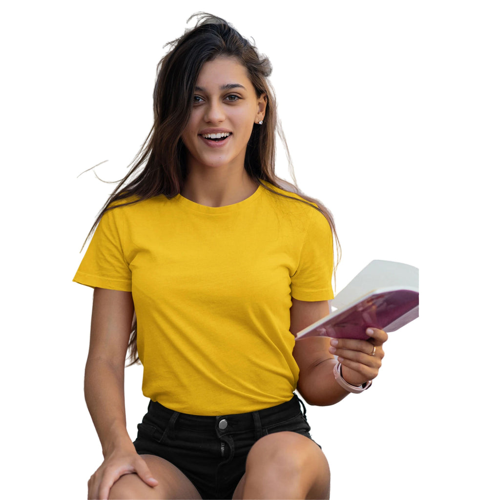 Woman wearing a yellow t-shirt holding a book on a white background