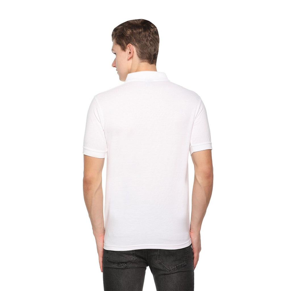 Man wearing a white polo t shirt on a white background